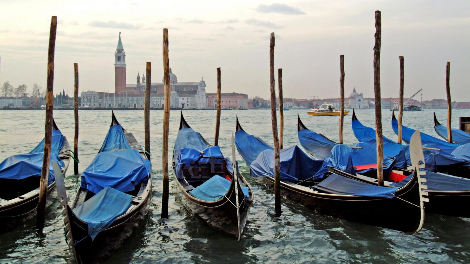 Venice canal with gondolier